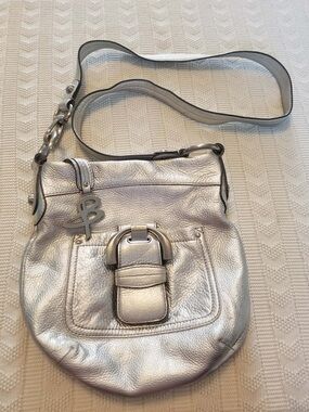 b. makowsky Silver Metallic Leather Crossbody with Buckle Charm